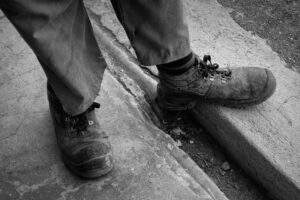 Worker with Well-Worn Boots, Middelpos, Karoo, South Africa (2024)