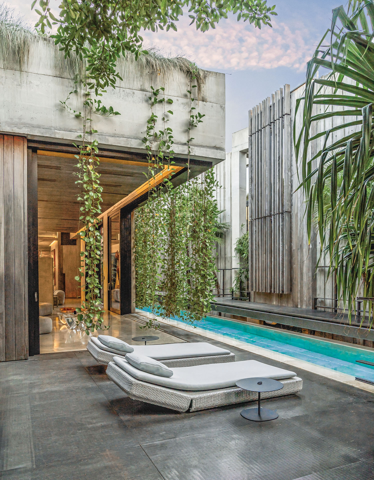 Power of water, outdoor pool setting with greenery